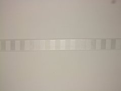 Jednobarevná atlasová stuha se vzorem 1,5cm/20m